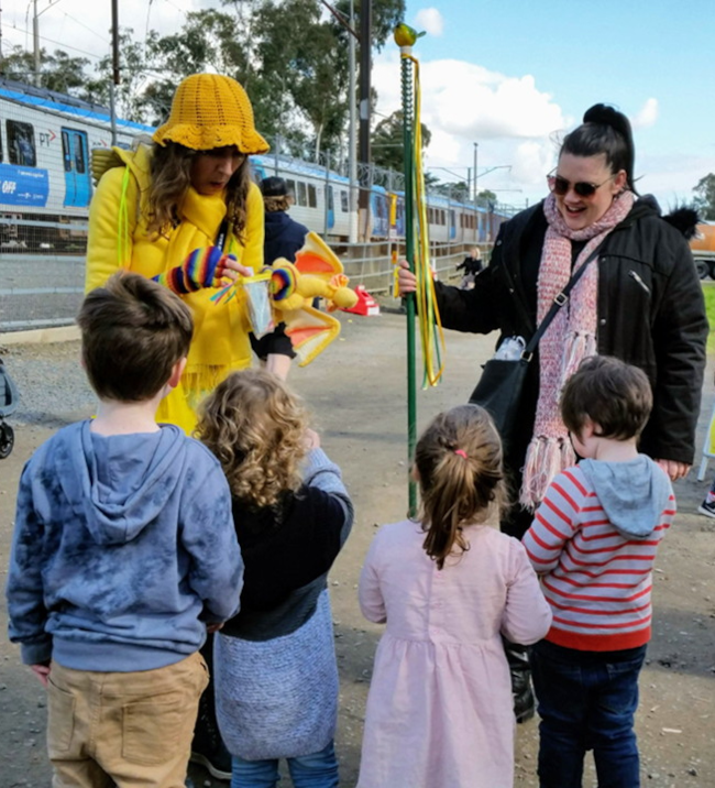 Katherine Phelps as the Wattle Fairy Godmother 2019 handing out stickers